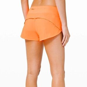 LULULEMON ORANGE SHORT SIZE 12 TALL